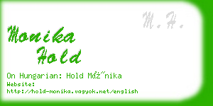 monika hold business card